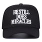 HE STILL DOES MIRACLES Embroidered Trucker Hat